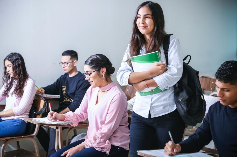 Girl in Class with Other Students