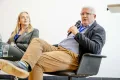 Panelist speaking into a Microphone at the Academic Freedom Forum
