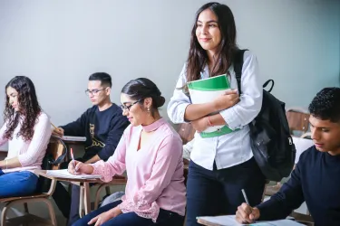 Girl in Class with Other Students