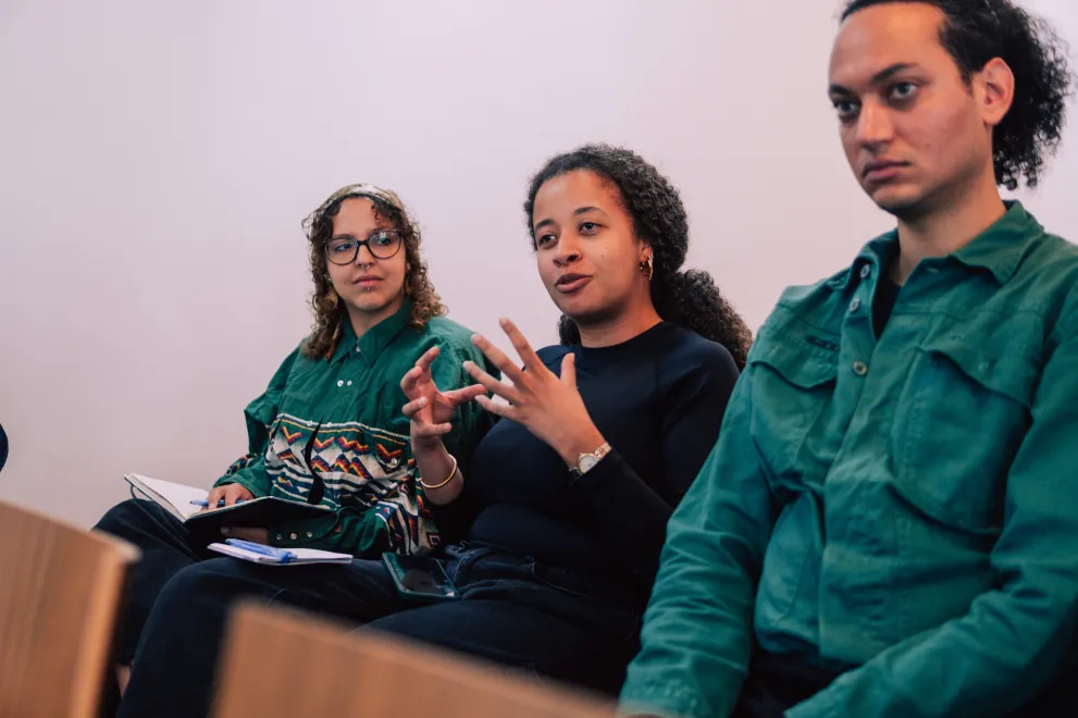 A Woman from the audience speaks at the Academic Freedom Forum
