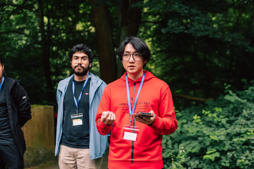Two men in the RUB Botanical Gardens at the Garden of Sanctuary Walk.