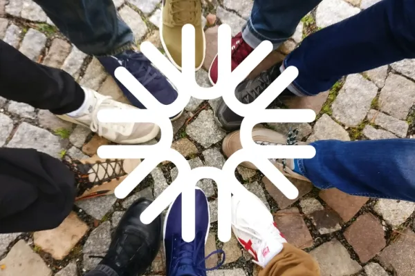 UNIC logo with students' feet